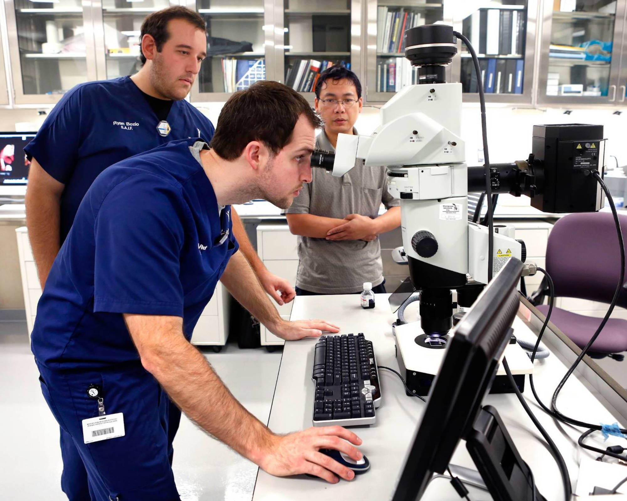 Students and Professor in Lab